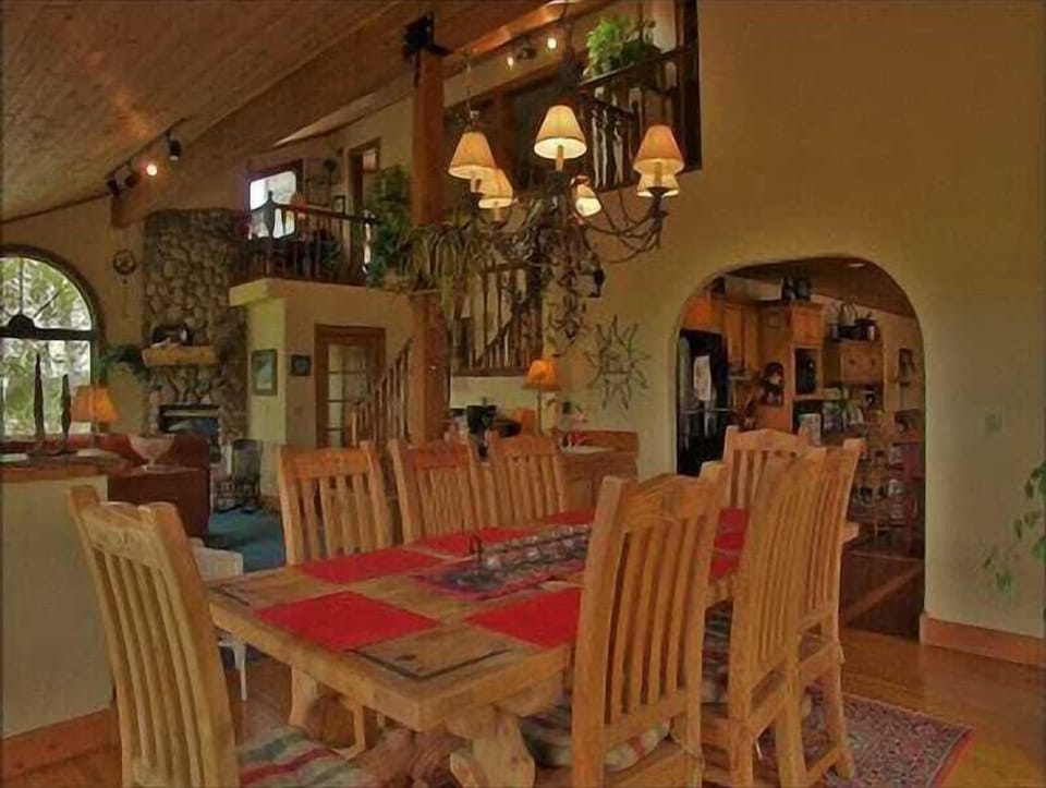 Formal Dining for 8 plus a a Wet Bar, beautiful Views, and Deck Access