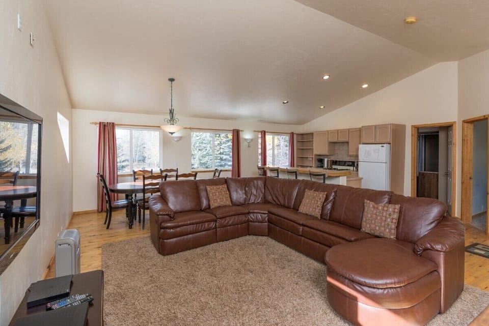 Third living room with reclining leather sofa