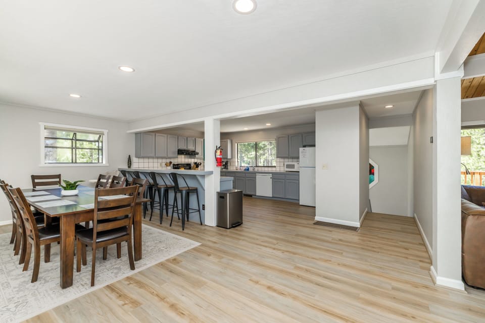 Stairs, New LVP Flooring, New Dining Table Seats (8) + (4) Bar Stools & Large Kitchen