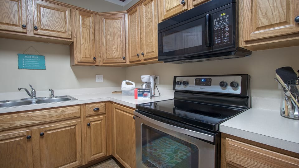Well stocked kitchen with plenty of pots and pans, food processor, mixer, etc.