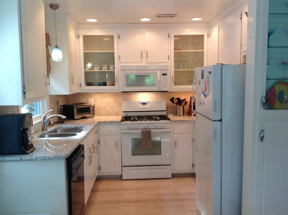 Updated kitchen with granite countertops.