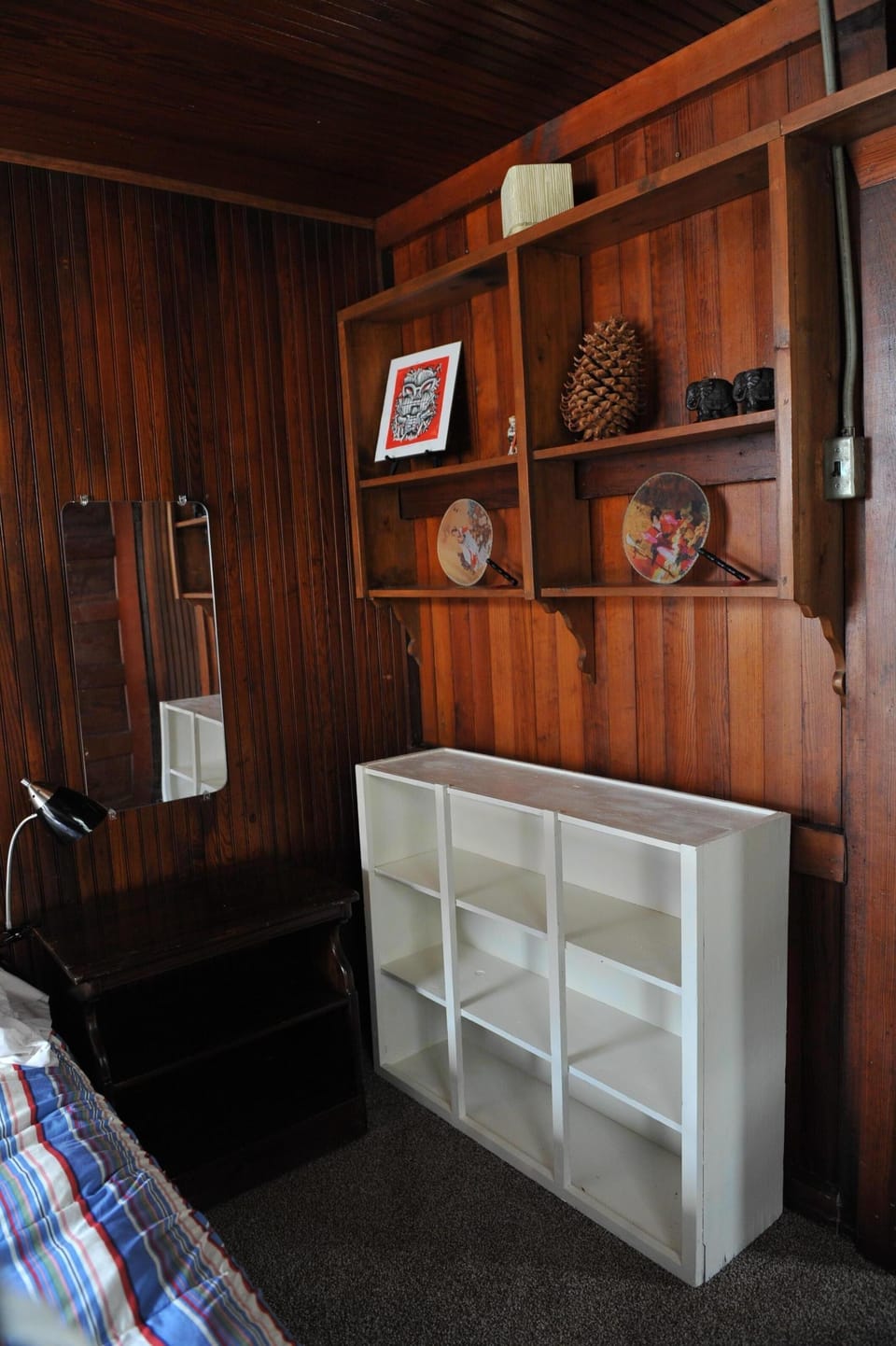Bunk bedroom shelves, opposite bunks.