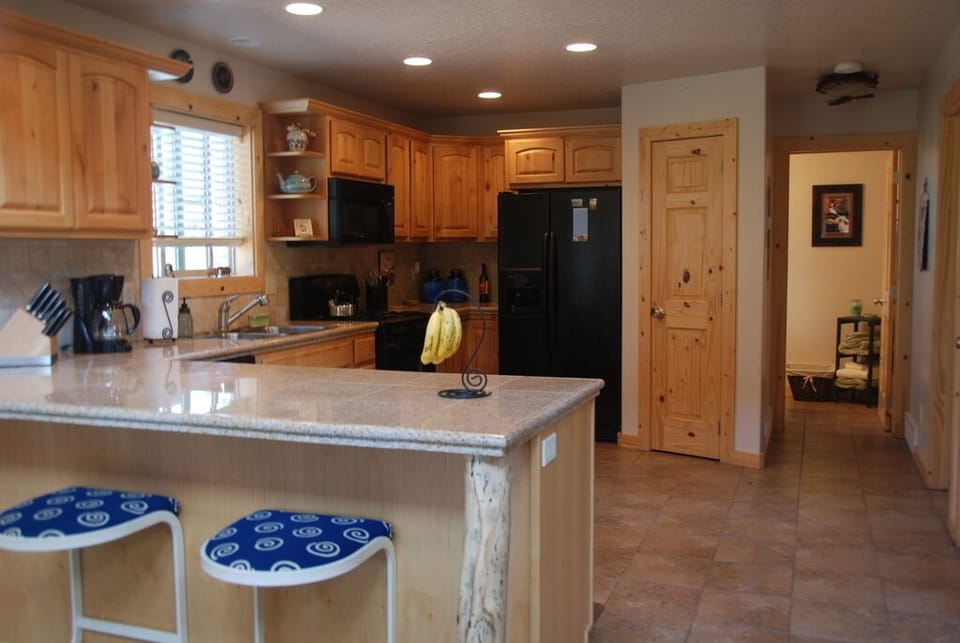 A large and well-equipped kitchen has everything you need for making tasty meals
