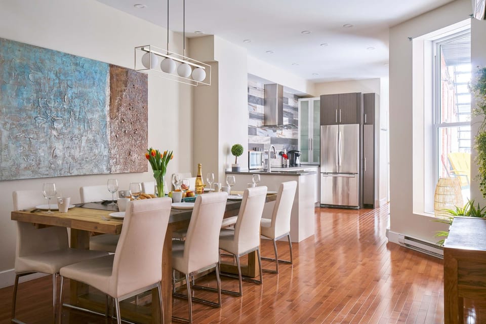 Inviting dining area next to the kitchen, view on the terrace