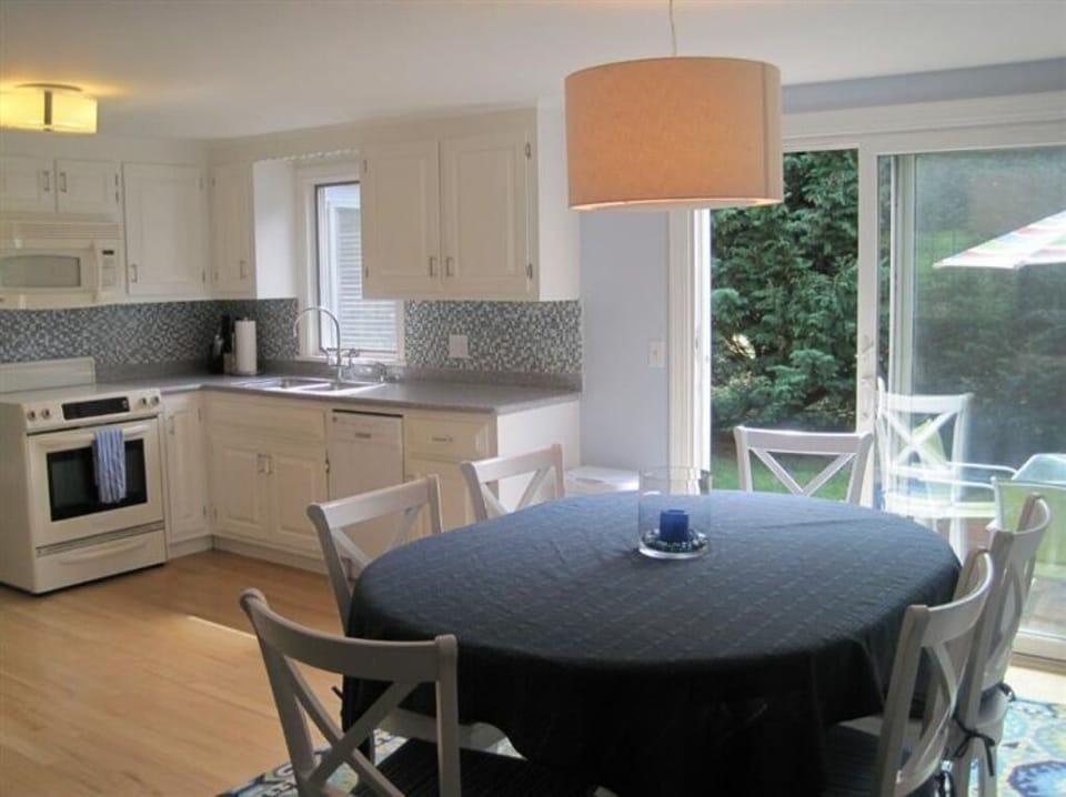 Kitchen/dinning room/sliding door to backyard patio