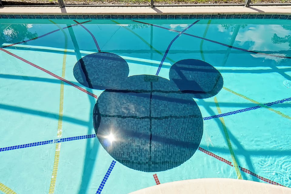 The custom pool surface features everyone's favorite mouse!