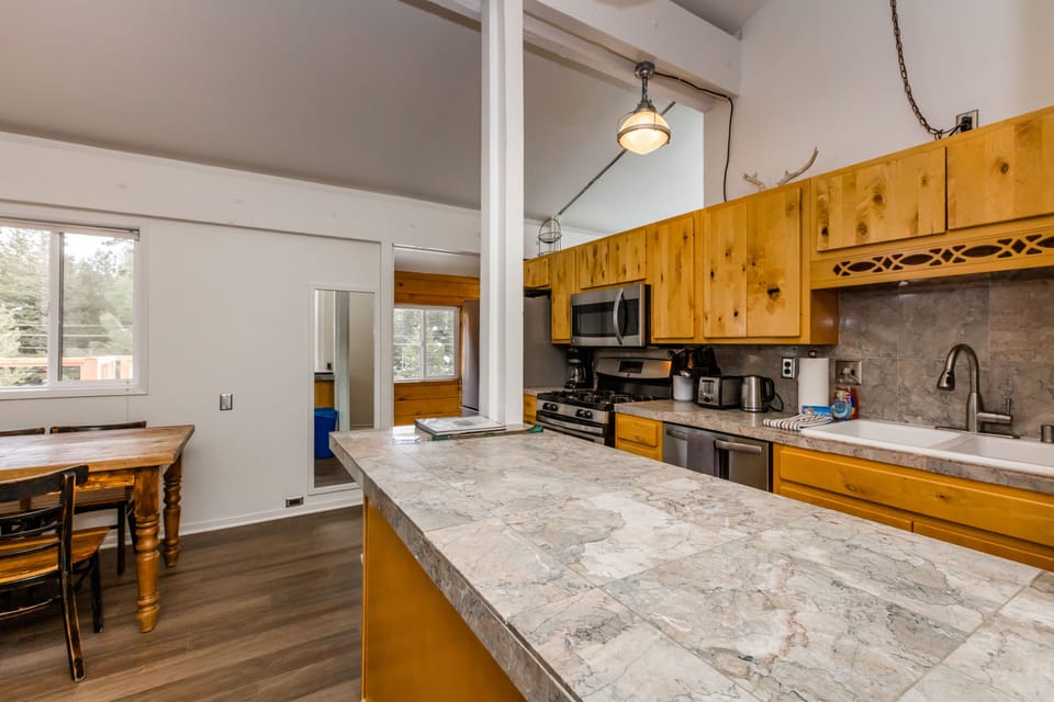 Kitchen Counter Island and Hallway to Master Room