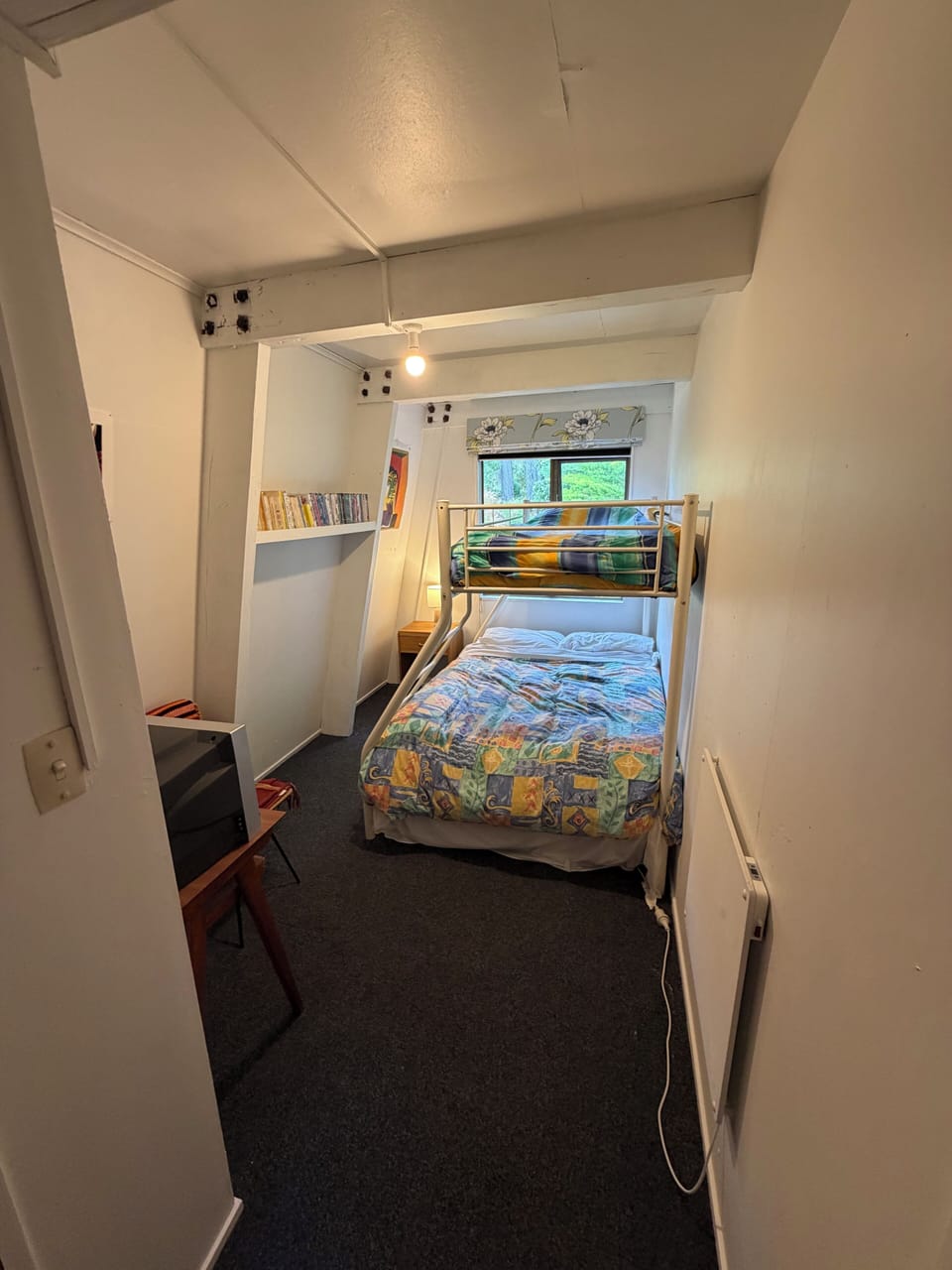 Third bedroom with double bed and bunk.