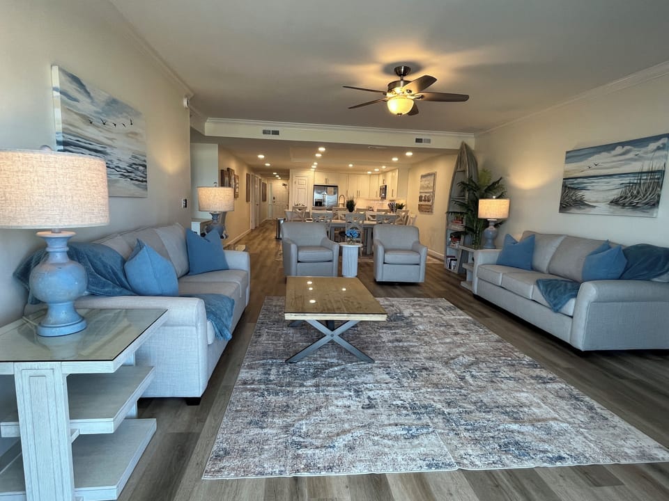 Reverse view of living room with 2 queen size sofa beds