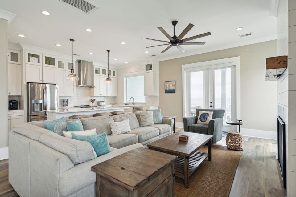 Back in the living room, you will fin plenty of comfortable seating to kick your feet up and relax.