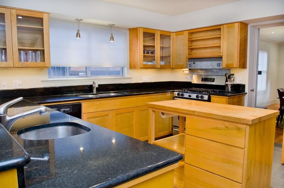 Kitchen with granite counter tops and stainless appliances