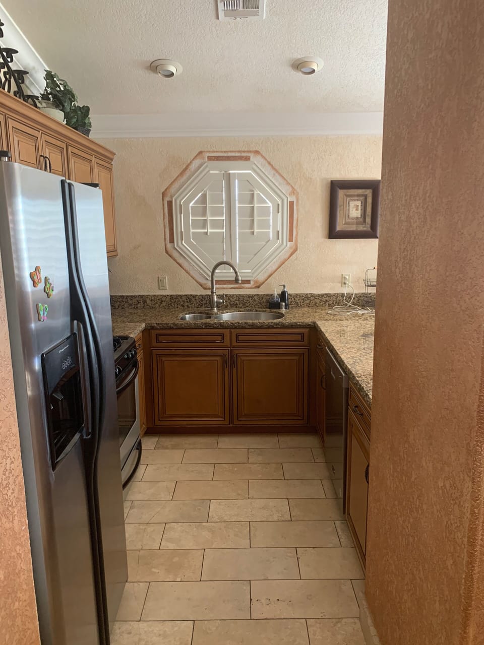 Fully Equipped Kitchen with Stainless Steel appliances - dishwasher, gas range
