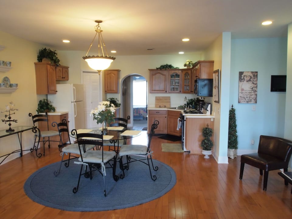 Full view of kitchen and dining area.