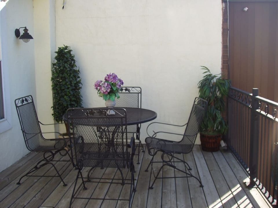 View of Deck off Master Bedroom. Over looks parking and other Downtown business.
