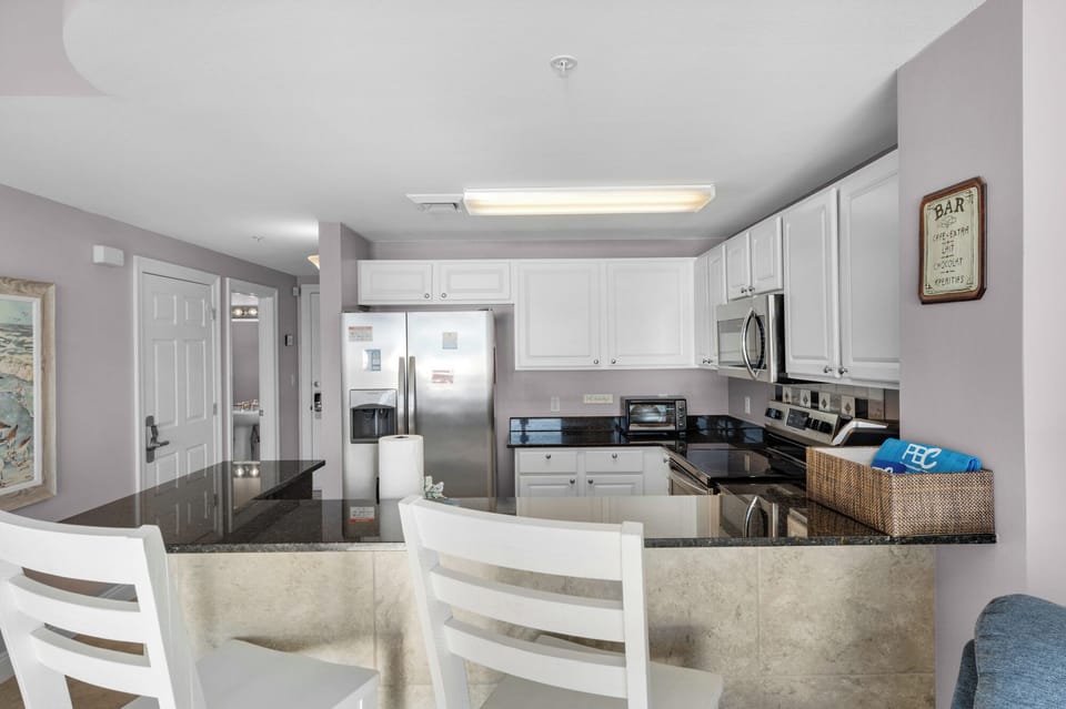 Step inside and immediately take in the stunning beauty of this unit and its breathtaking Gulf views.