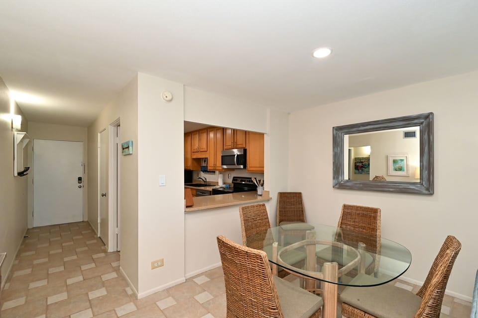 Dining room is right off the kitchen with seating for four