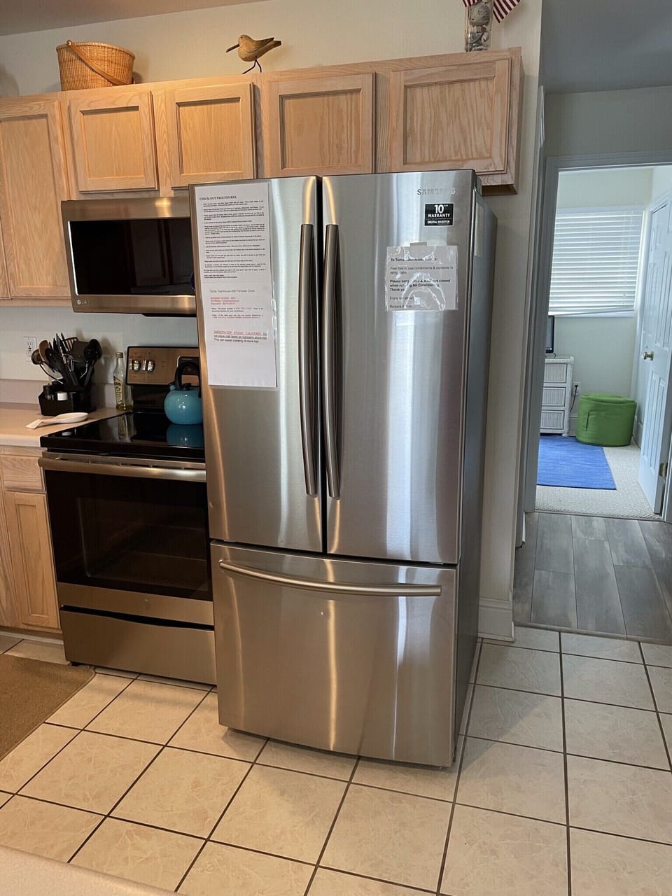 Stainless-steel Appliances:  French door fridge, smooth-top stove, Microwave