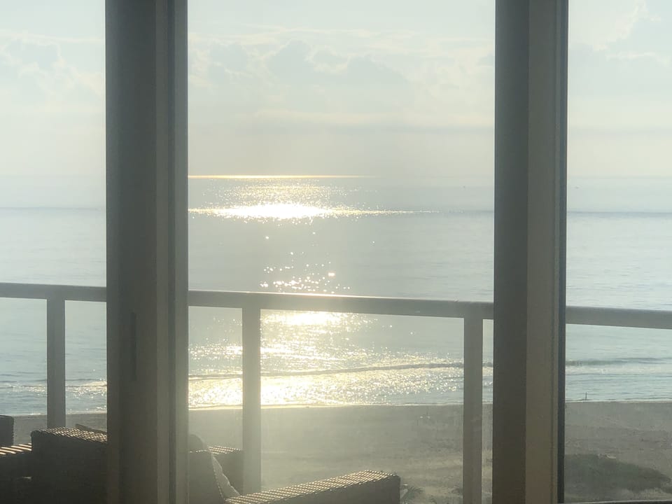 Private balcony overlooking the ocean — perfect sunrise spot, View from couch.