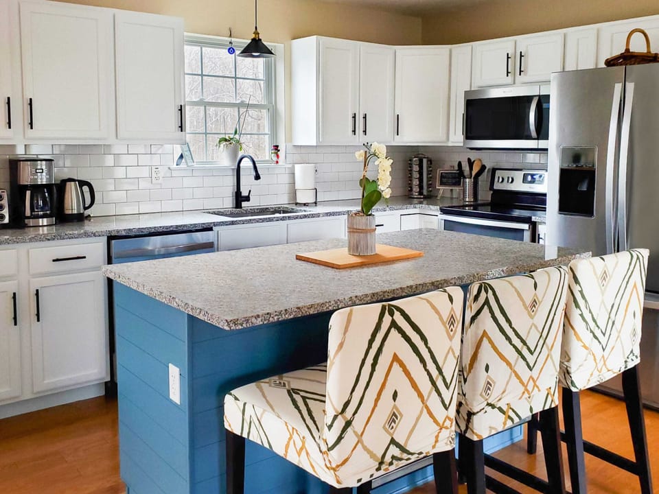 Fully equipped kitchen with stainless appliances, toaster oven, drip coffee maker, electric kettle and more