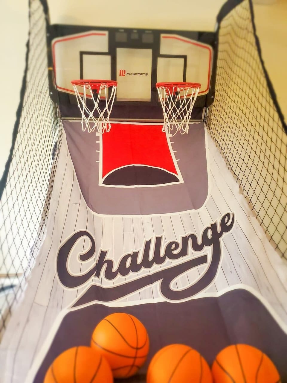 Basketball arcade is readily available for a friendly competition in the attached garage