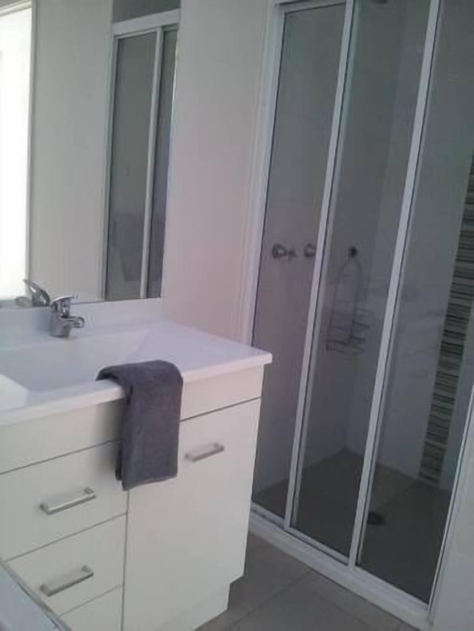 Bathroom with separate walk in shower