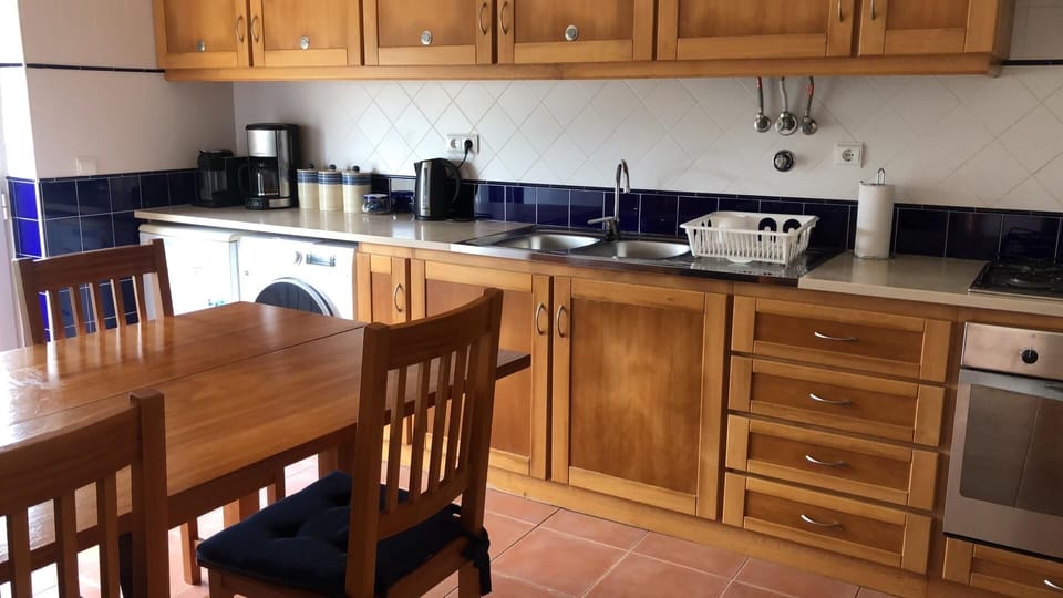 Kitchen with doors onto private garden area