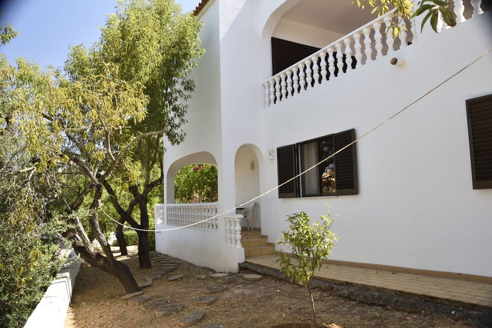 West side of villa with almond trees