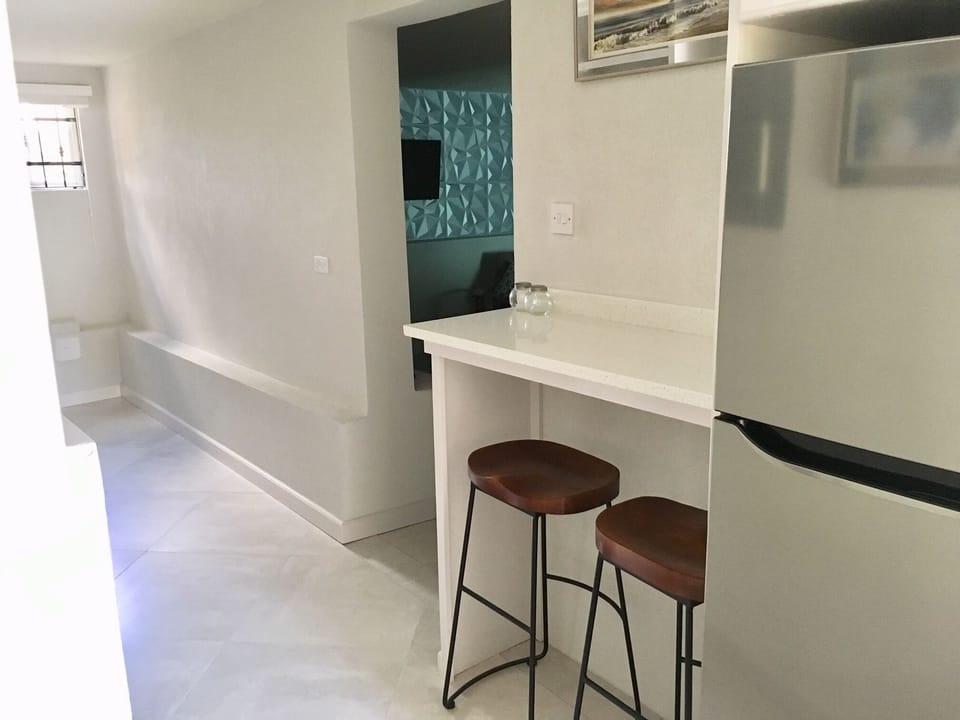  Hallway ( view of fridge and dining bar)