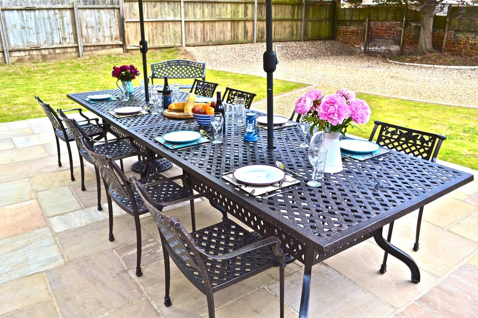 Patio in enclosed garden.