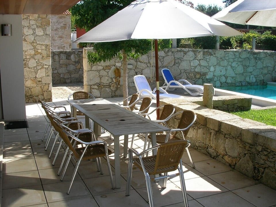 Seating for ten by the pool
