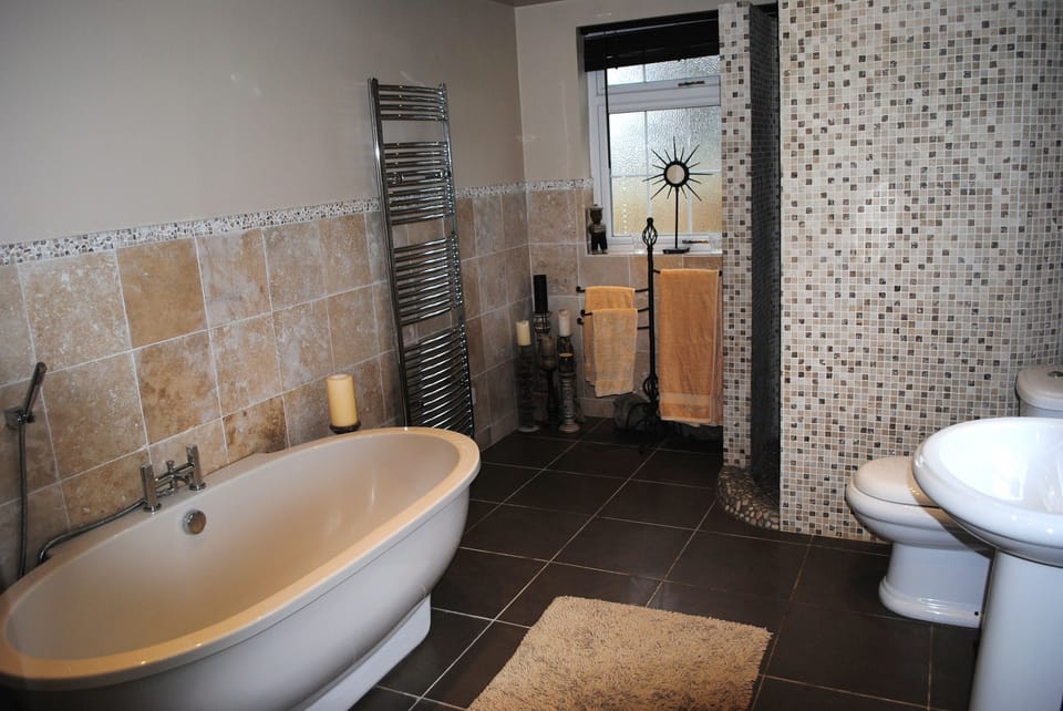 Main Bathroom, ground floor. With walk in shower.