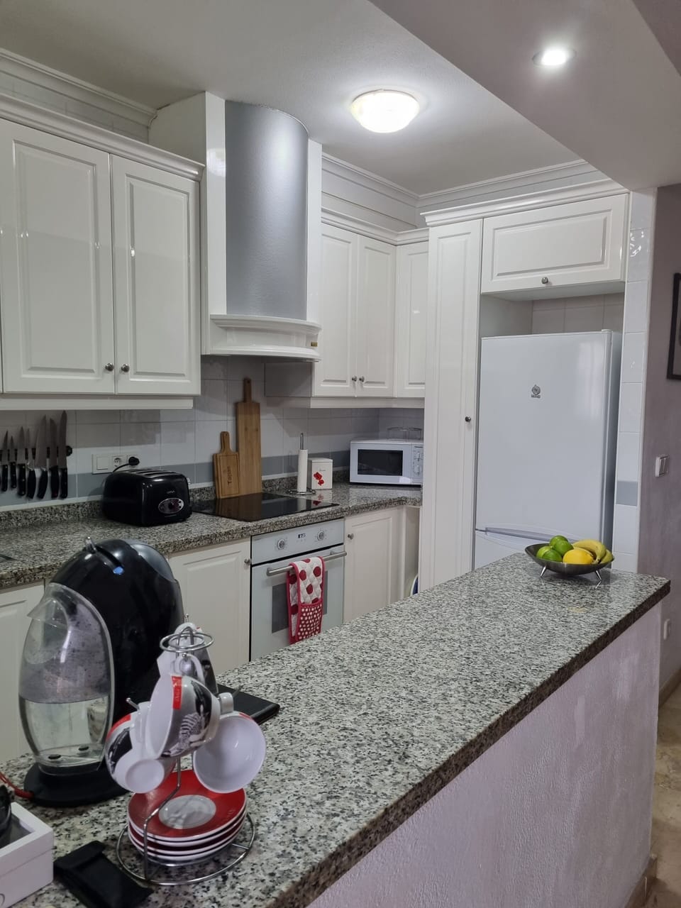 Kitchen showing some white goods