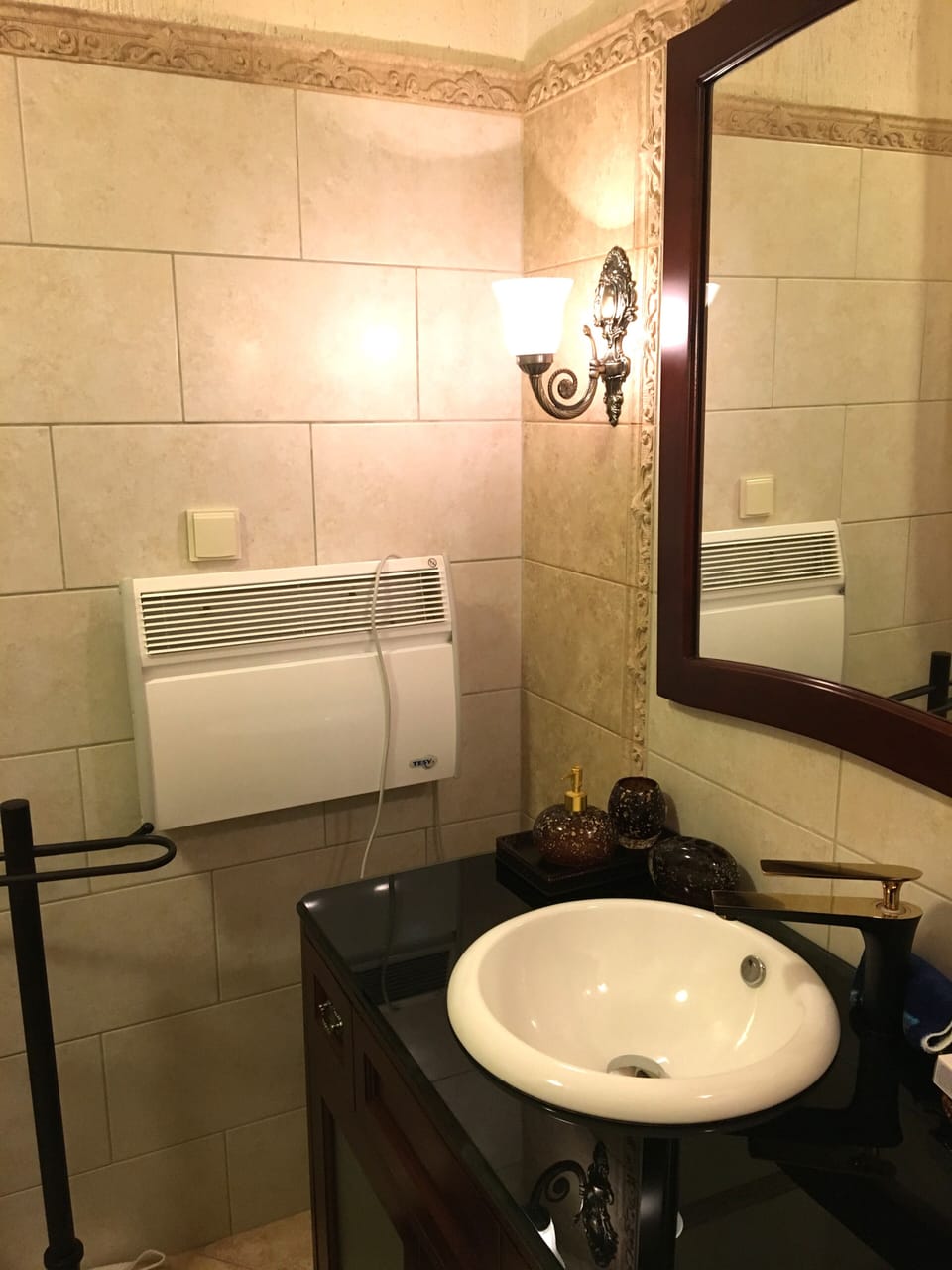 Full bathroom on main level with traditional stand up shower