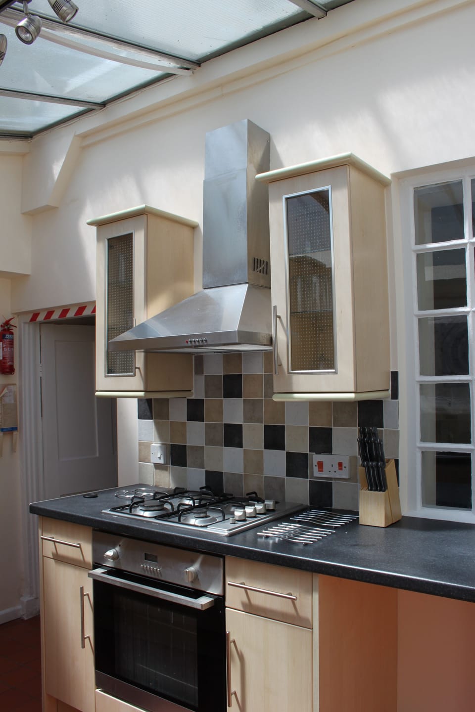 Kitchen on the Ground Floor, showing gas hob, electric oven and extractor fan