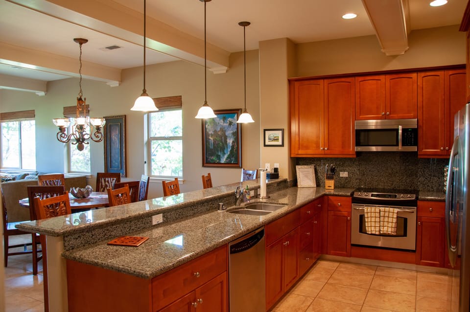 Kitchen, with stainless steel appliances and granite counters