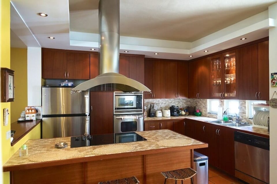 Open plan and fully stocked Kitchen