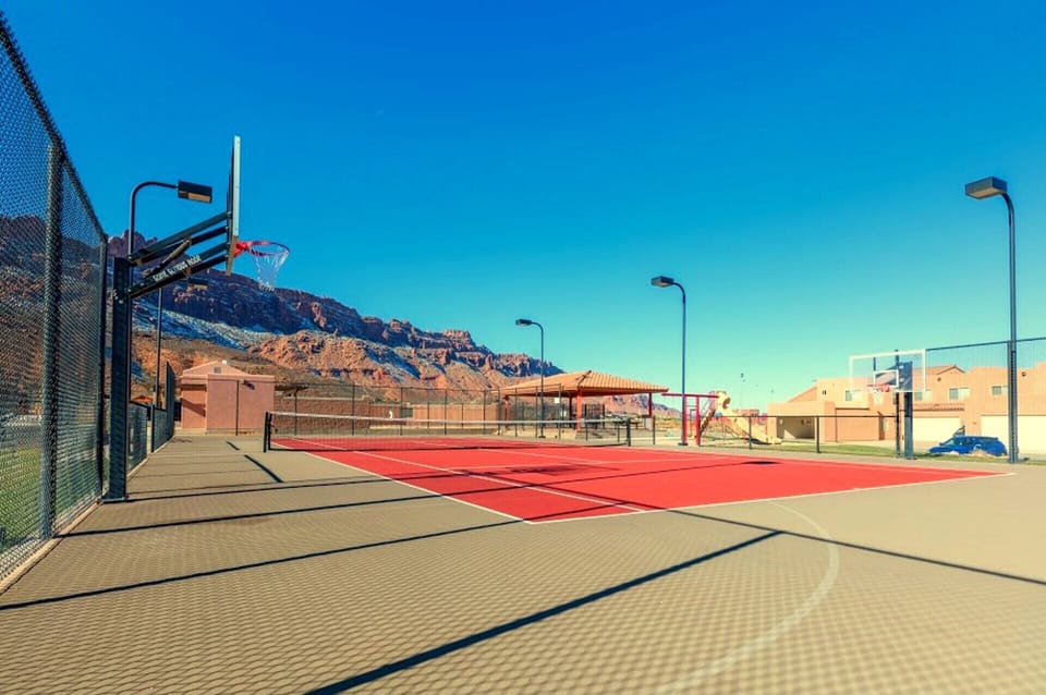 HOA Tennis court with side Basketball hoop