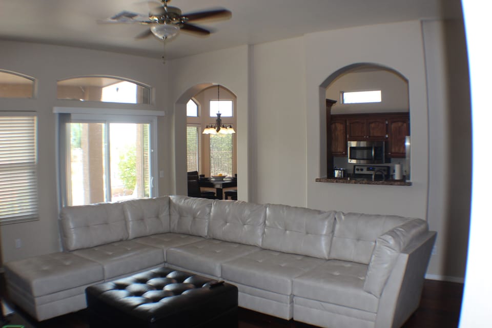 Living room, looking into kitchen. All furniture is like new!