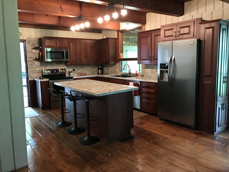 Kitchen comes fully equipped with crockpot, coffee maker, and blender