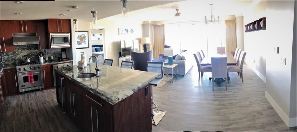 Kitchen, Living and Dining Room with direct ocean views.