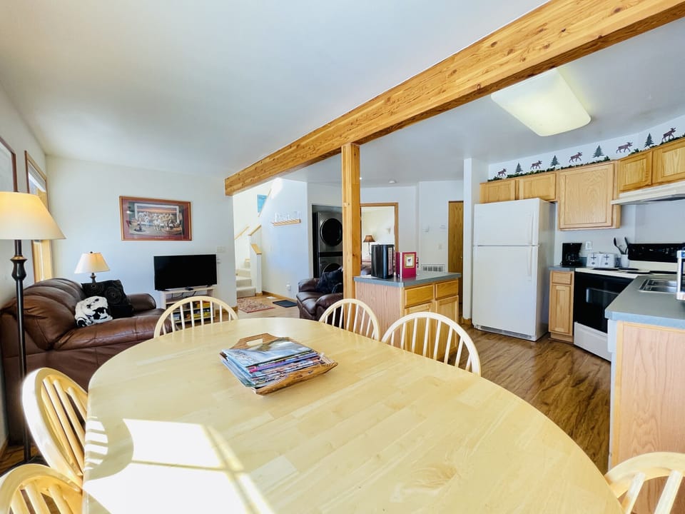Dining Room with View of Kitchen and Living Room