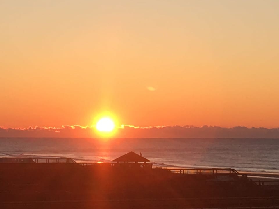 You will be greeted each morning with sunrise over the ocean from the upper deck