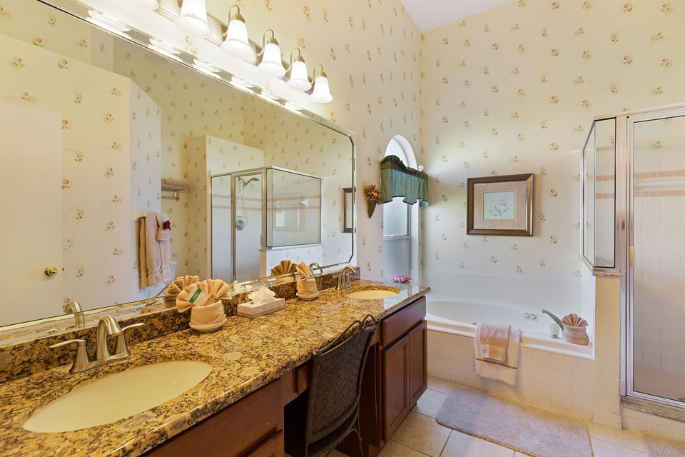 Master Bathroom with granite counter tops and new cabinets.
