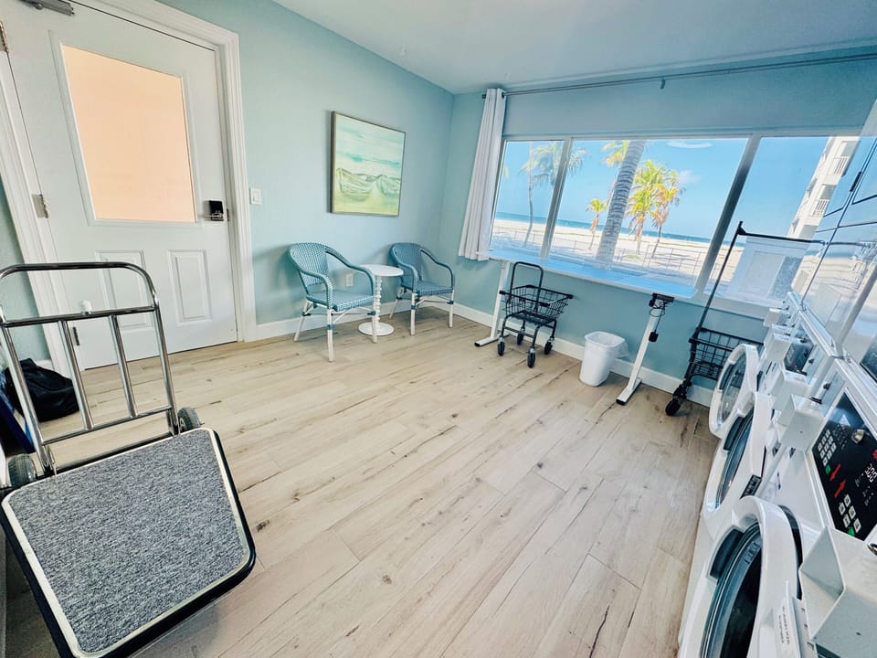 Laundry facilities overlook the pool. Doing laundry never looked so good!