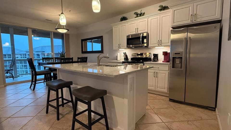 Recently updated kitchen with quartz countertops, Keurig coffee maker