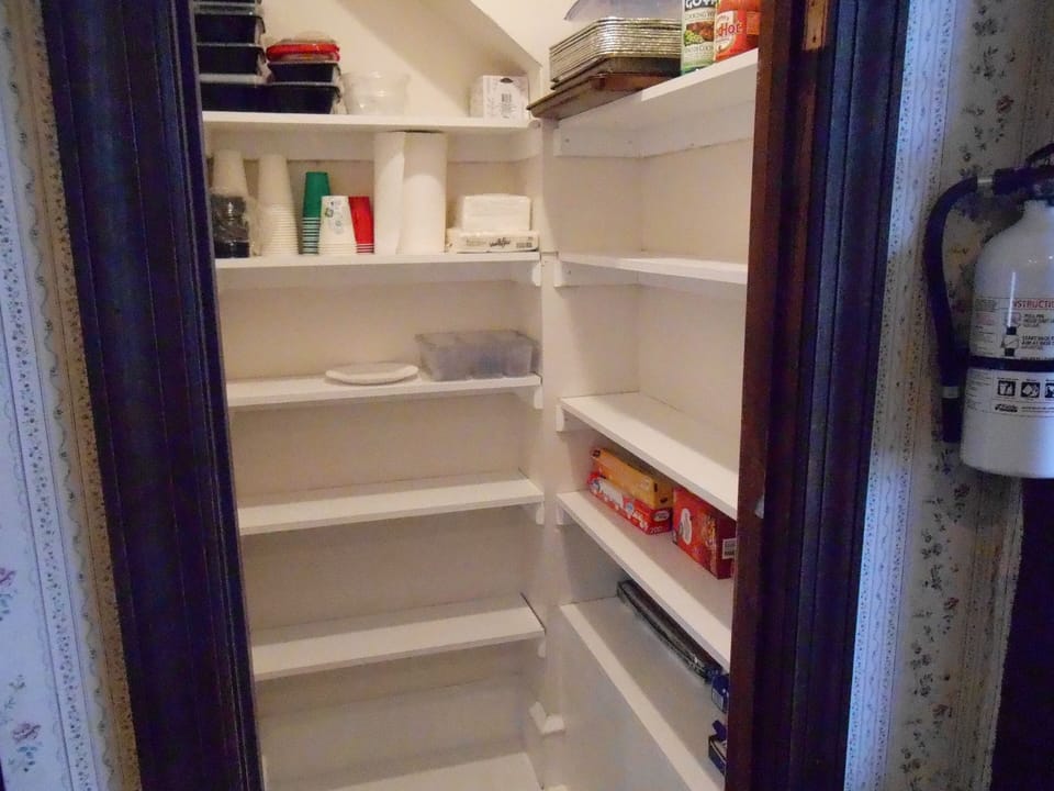 Pantry in the Kitchen near Refrigerator