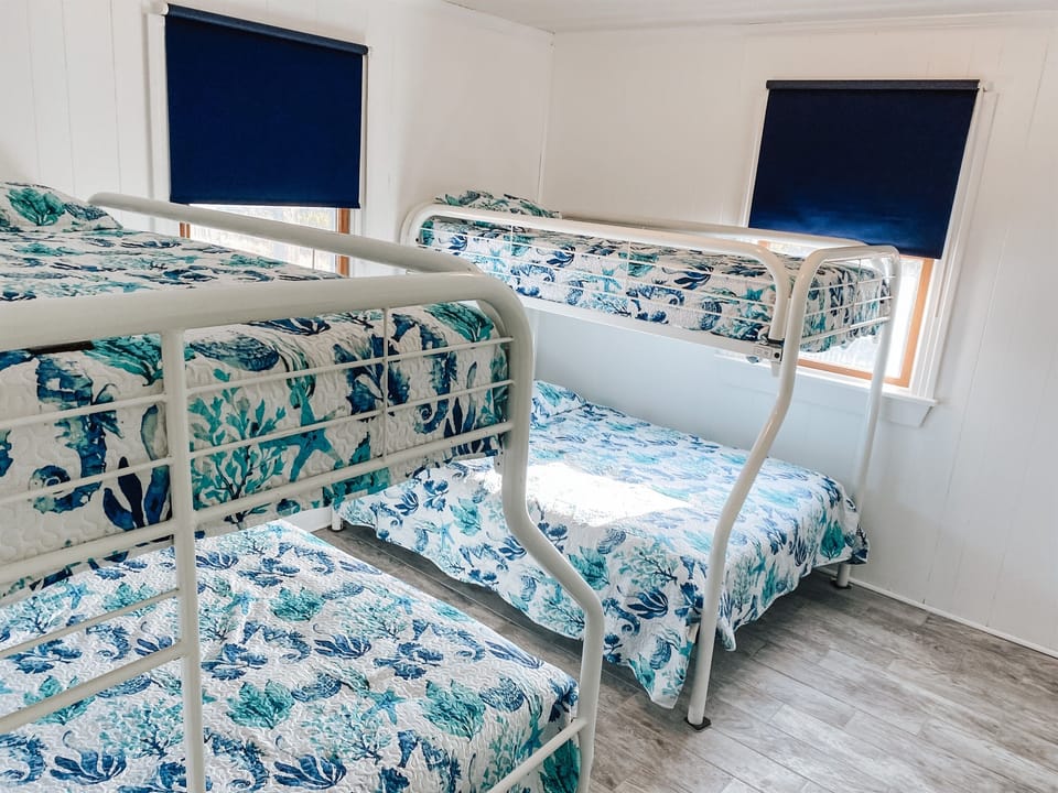 Back Bunk Bedroom with 2 pyramid bunks (twin over double) with TV.