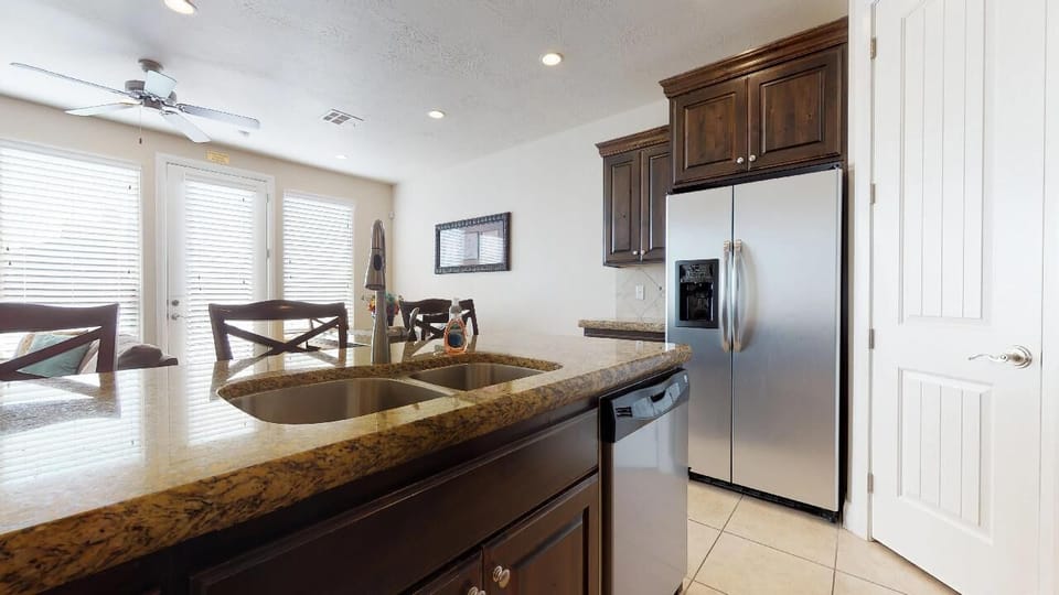 Fully Stocked Gourmet kitchen featuring granite countertops