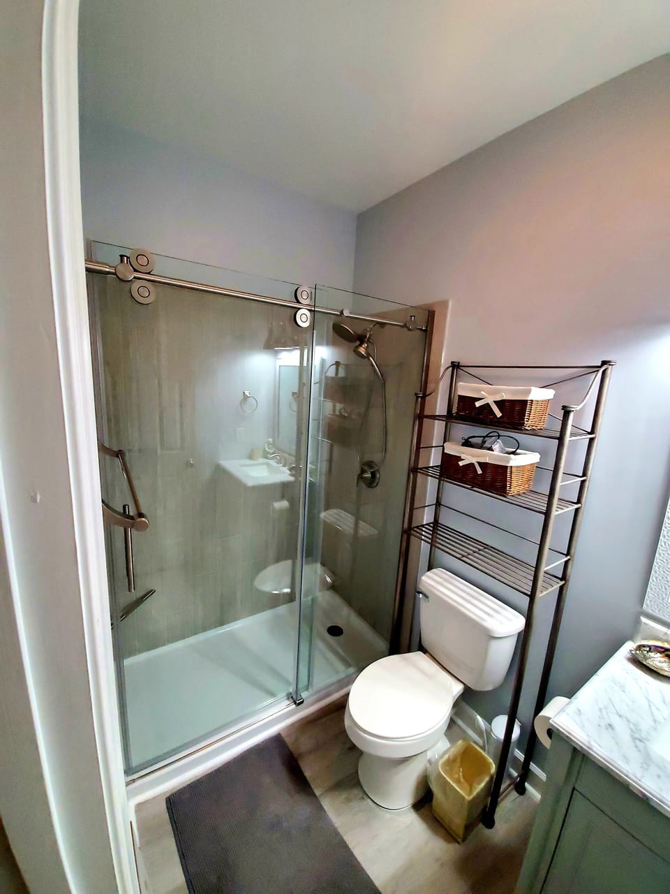Updated Master bathrooms, walk-in shower with glass doors and foot rests