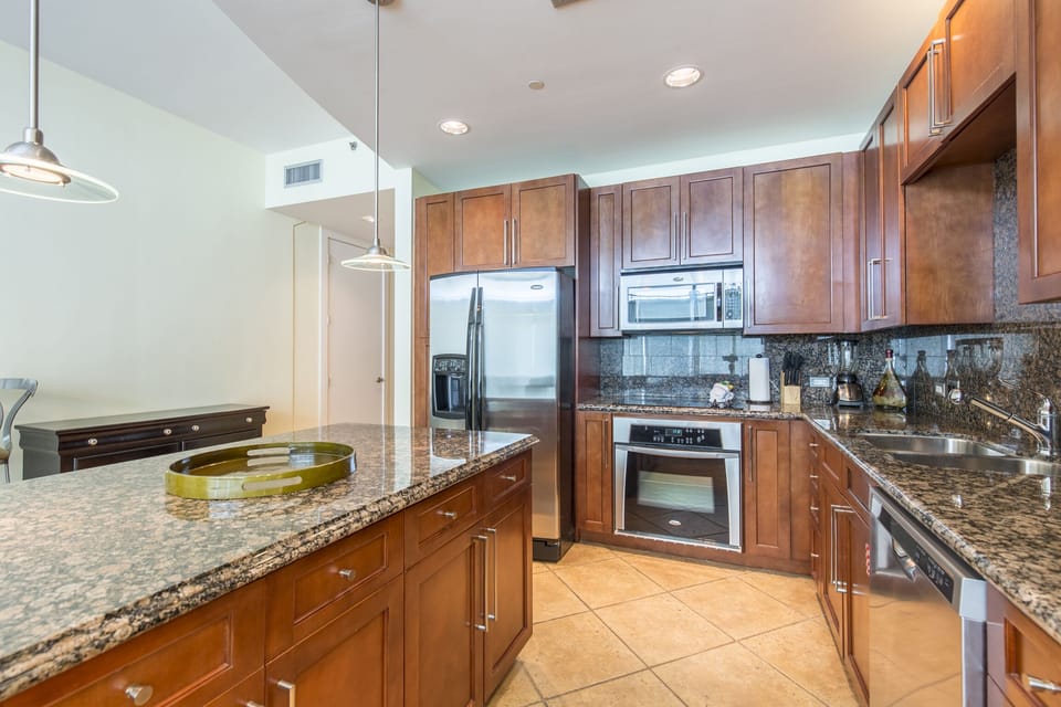 Stainless steel appliances including dishwasher.